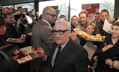 Director Martin Scorsese signs autographs as he arrives on the red carpet before the screening of "Untitled New York Review of Books Documen Director Martin Scorsese signs autographs as he arrives on the red carpet before the screening of "Untitled New York Review of Books Documen
