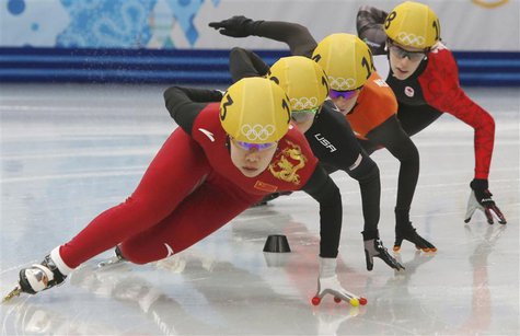 China's Zhou Yang leads as she takes a curve during a women's 1,500 metres short track speed skating heat event at the Iceberg Skating Palac China's Zhou Yang leads as she takes a curve during a women's 1,500 metres short track speed skating heat event at the Iceberg Skating Palac