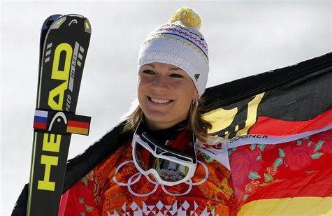 Second-placed Germany's Maria Hoefl-Riesch poses on podium during the flower ceremony for the women's alpine skiing Super G competition duri Second-placed Germany's Maria Hoefl-Riesch poses on podium during the flower ceremony for the women's alpine skiing Super G competition duri