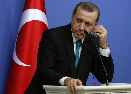 Turkish Prime Minister Tayyip Erdogan listens to a question during a news conference in Ankara February 11, 2014. REUTERS/Umit Bektas Turkish Prime Minister Tayyip Erdogan listens to a question during a news conference in Ankara February 11, 2014. REUTERS/Umit Bektas