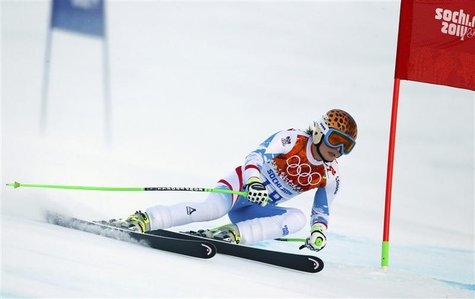 Austria's Anna Fenninger clears a gate during the women's alpine skiing Super G competition at the 2014 Sochi Winter Olympics at the Rosa Kh Austria's Anna Fenninger clears a gate during the women's alpine skiing Super G competition at the 2014 Sochi Winter Olympics at the Rosa Kh