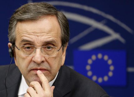 Greek Prime Minister Antonis Samaras attends a news conference after a debate on the program of Greece's presidency of the EU for the next s Greek Prime Minister Antonis Samaras attends a news conference after a debate on the program of Greece's presidency of the EU for the next s