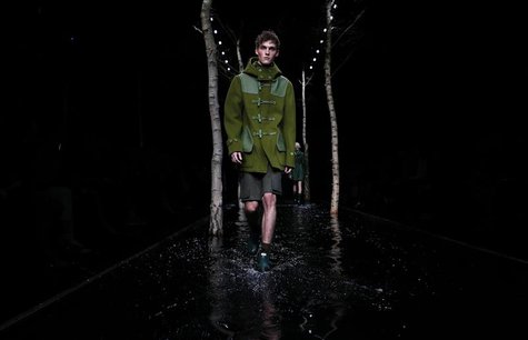 A model presents a creation from the Hunter Autumn/Winter 2014 collection during London Fashion Week February 15, 2014. REUTERS/Suzanne Plun A model presents a creation from the Hunter Autumn/Winter 2014 collection during London Fashion Week February 15, 2014. REUTERS/Suzanne Plun