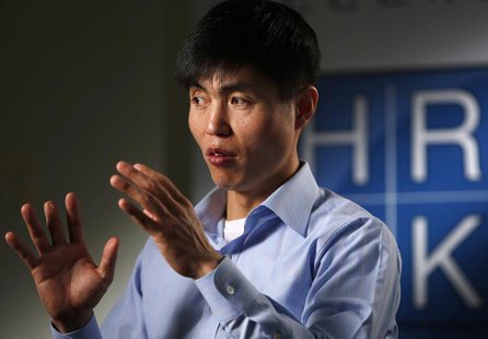 Human rights activist Shin Dong-hyuk gestures during a Reuters interview in Washington December 19, 2013. REUTERS/Gary Cameron Human rights activist Shin Dong-hyuk gestures during a Reuters interview in Washington December 19, 2013. REUTERS/Gary Cameron