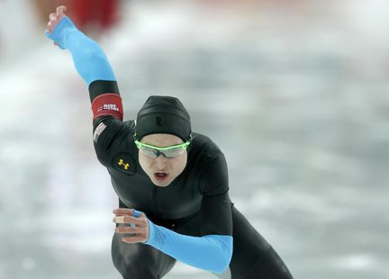 Jonathan Kuck of the U.S. competes in an older suite in the men's 1,500 metres speed skating race during the 2014 Sochi Winter Olympics, Feb Jonathan Kuck of the U.S. competes in an older suite in the men's 1,500 metres speed skating race during the 2014 Sochi Winter Olympics, Feb