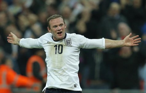 England's Wayne Rooney celebrates after scoring during their 2014 World Cup qualifying soccer match against Poland at Wembley Stadium in Lon England's Wayne Rooney celebrates after scoring during their 2014 World Cup qualifying soccer match against Poland at Wembley Stadium in Lon