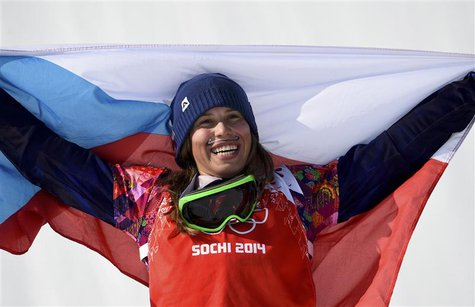 First placed Eva Samkova of the Czech Republic celebrates after the women's snowboard cross finals at the 2014 Sochi Winter Olympic Games in First placed Eva Samkova of the Czech Republic celebrates after the women's snowboard cross finals at the 2014 Sochi Winter Olympic Games in