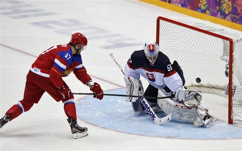 Russia's Alexander Radulov (L) scores on Slovakia's goalie Jan Laco on his team's first shootout attempt during their men's preliminary roun Russia's Alexander Radulov (L) scores on Slovakia's goalie Jan Laco on his team's first shootout attempt during their men's preliminary roun