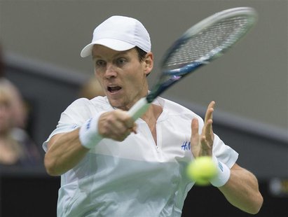 Tomas Berdych of Czech Republic hits a forehand against Marin Cilic of Croatia during their final match of the ABN AMRO tennis tournament in Tomas Berdych of Czech Republic hits a forehand against Marin Cilic of Croatia during their final match of the ABN AMRO tennis tournament in