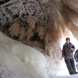Sightseers look at ice formations in sea caves of the Apostle Islands National Lakeshore of Lake Superior near Cornucopia, Wisconsin Februar Sightseers look at ice formations in sea caves of the Apostle Islands National Lakeshore of Lake Superior near Cornucopia, Wisconsin Februar