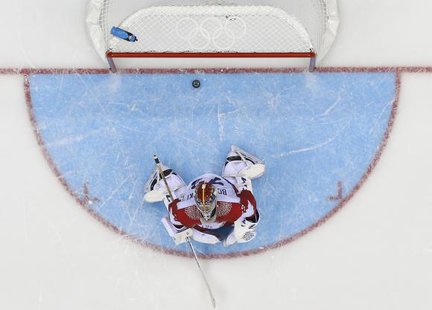 Russia's goalie Sergei Bobrovski reacts after giving up the game-winning goal to Team USA's T.J. Oshie (not seen) during a shootout in their men's preliminary round ice hockey game at the Sochi 2014 Winter Olympic Games February 15, 2014. Credit: Reuters/Mark Blinch
Russia's goalie Sergei Bobrovski reacts after giving up the game-winning goal to Team USA's T.J. Oshie (not seen) during a shootout in their men's preliminary round ice hockey game at the Sochi 2014 Winter Olympic Games February 15, 2014. Credit: Reuters/Mark Blinch