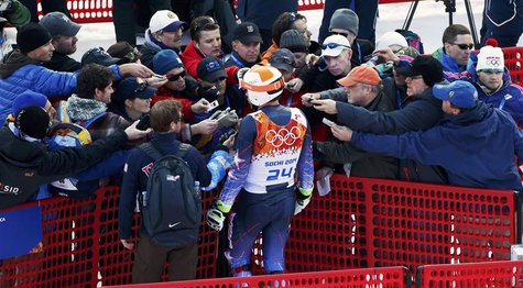 Bode Miller of the U.S. is surrounded by the media during the slalom run of the men's alpine skiing super combined event at the 2014 Sochi W Bode Miller of the U.S. is surrounded by the media during the slalom run of the men's alpine skiing super combined event at the 2014 Sochi W