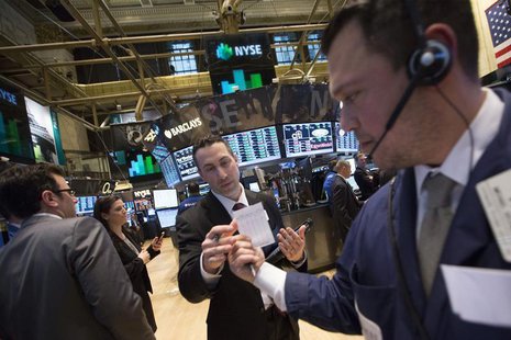 Traders use a paper trading slip on the floor of the New York Stock Exchange February 13, 2014. REUTERS/Brendan McDermid Traders use a paper trading slip on the floor of the New York Stock Exchange February 13, 2014. REUTERS/Brendan McDermid