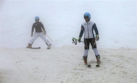 Austria's Kathrin Zettel (R) skis down as she attends an Alpine skiing training session during the 2014 Sochi Winter Olympics at the Rosa Kh Austria's Kathrin Zettel (R) skis down as she attends an Alpine skiing training session during the 2014 Sochi Winter Olympics at the Rosa Kh