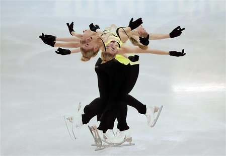 Gracie Gold of the U.S. practises her routine during a figure skating training session at the Iceberg Skating Palace training arena during t Gracie Gold of the U.S. practises her routine during a figure skating training session at the Iceberg Skating Palace training arena during t