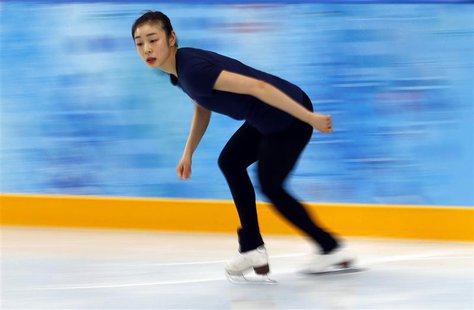 South Korea's Kim Yuna practices her routine during a figure skating training session at the Iceberg Skating Palace training arena during th South Korea's Kim Yuna practices her routine during a figure skating training session at the Iceberg Skating Palace training arena during th