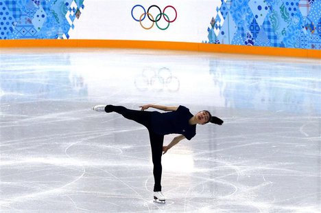 South Korea's Kim Yuna practises her routine during a figure skating training session at the Iceberg Skating Palace training arena during th South Korea's Kim Yuna practises her routine during a figure skating training session at the Iceberg Skating Palace training arena during th