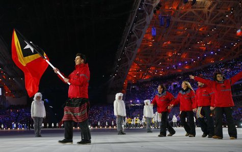 Flag-bearer Yohan Goncalves of Democratic Republic of Timor-Leste leads his country's delegation during the opening ceremony of the 2014 Soc Flag-bearer Yohan Goncalves of Democratic Republic of Timor-Leste leads his country's delegation during the opening ceremony of the 2014 Soc
