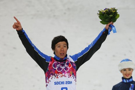 China's third placed Jia Zongyang celebrates on podium after the men's freestyle skiing aerials finals at the 2014 Sochi Winter Olympic Game China's third placed Jia Zongyang celebrates on podium after the men's freestyle skiing aerials finals at the 2014 Sochi Winter Olympic Game