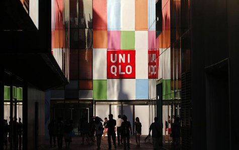People stand outside a UNIQLO shop in Beijing, August 24, 2013. REUTERS/Petar Kujundzic People stand outside a UNIQLO shop in Beijing, August 24, 2013. REUTERS/Petar Kujundzic