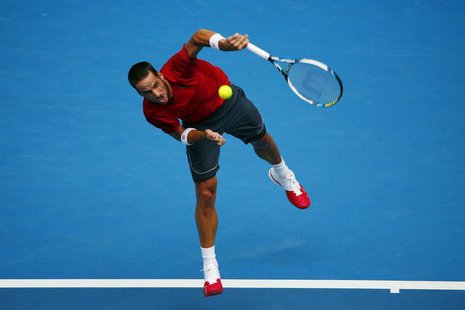 Feliciano Lopez of Spain serves to Andy Murray of Britain during their men's singles match at the Australian Open 2014 tennis tournament in Feliciano Lopez of Spain serves to Andy Murray of Britain during their men's singles match at the Australian Open 2014 tennis tournament in