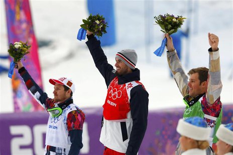 Second-placed Russia's Nikolay Olyunin, winner France's Pierre Vaultier and third-placed Alex Deibold of the U.S. celebrate after their men' Second-placed Russia's Nikolay Olyunin, winner France's Pierre Vaultier and third-placed Alex Deibold of the U.S. celebrate after their men'