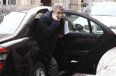 Iran's ambassador to Austria Hassan Tajik leaves his limousine as he arrives at a hotel in Vienna February 17, 2014. REUTERS/Heinz-Peter Bad Iran's ambassador to Austria Hassan Tajik leaves his limousine as he arrives at a hotel in Vienna February 17, 2014. REUTERS/Heinz-Peter Bad