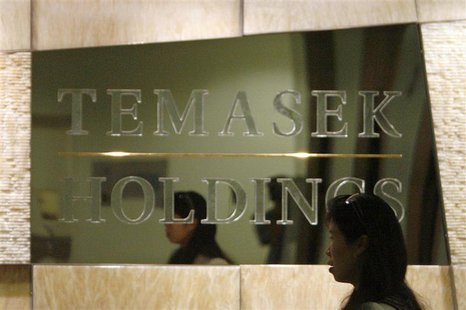 An employee walks past a Temasek Holdings sign at the company's headquarters in Singapore in this August 2, 2007 file photo. REUTERS/Vivek P An employee walks past a Temasek Holdings sign at the company's headquarters in Singapore in this August 2, 2007 file photo. REUTERS/Vivek P