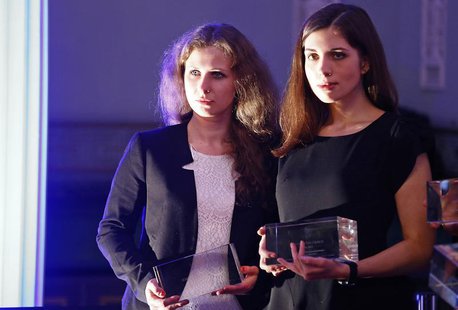 Russian punk band Pussy Riot members Maria Alyokhina (L) and Nadezhda Tolokonnikova pose after winning a trophy in the category "Most Valuab Russian punk band Pussy Riot members Maria Alyokhina (L) and Nadezhda Tolokonnikova pose after winning a trophy in the category "Most Valuab