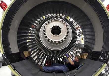 General Electric employee Jim Jones assembles a GE90 engine at the GE Aviation Peebles Test Operations Facility in Peebles, Ohio, November 1 General Electric employee Jim Jones assembles a GE90 engine at the GE Aviation Peebles Test Operations Facility in Peebles, Ohio, November 1