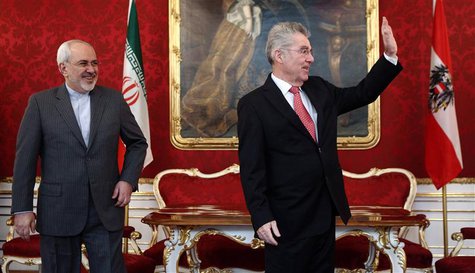 Austrian President Heinz Fischer (R) waves as he receives Iranian Foreign Minister Ali Akbar Salehi in his office in Vienna February 18, 201 Austrian President Heinz Fischer (R) waves as he receives Iranian Foreign Minister Ali Akbar Salehi in his office in Vienna February 18, 201