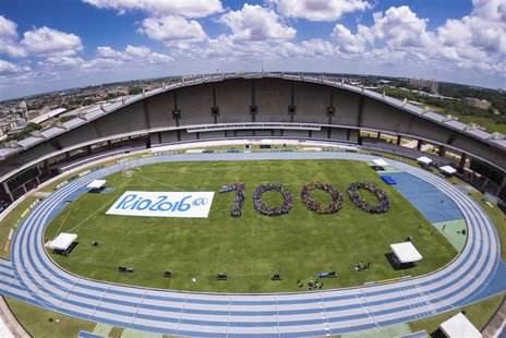 Some 1,000 young athletes stand in a formation to celebrate the 1000-day countdown to the opening of the Rio 2016 Olympic Games at the Brazi Some 1,000 young athletes stand in a formation to celebrate the 1000-day countdown to the opening of the Rio 2016 Olympic Games at the Brazi