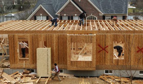 Workers build a new house in Alexandria, Virginia February 16, 2012. REUTERS/Kevin Lamarque Workers build a new house in Alexandria, Virginia February 16, 2012. REUTERS/Kevin Lamarque