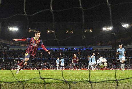 Barcelona's Lionel Messi celebrates after scoring a penalty against Manchester City during their Champions League round of 16 first leg socc Barcelona's Lionel Messi celebrates after scoring a penalty against Manchester City during their Champions League round of 16 first leg socc