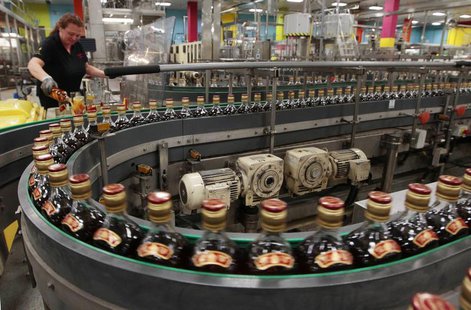 Bottles of Johnnie Walker whisky move along on the production line at the Diageo owned Shieldhall bottling plant in Glasgow, Scotland March Bottles of Johnnie Walker whisky move along on the production line at the Diageo owned Shieldhall bottling plant in Glasgow, Scotland March