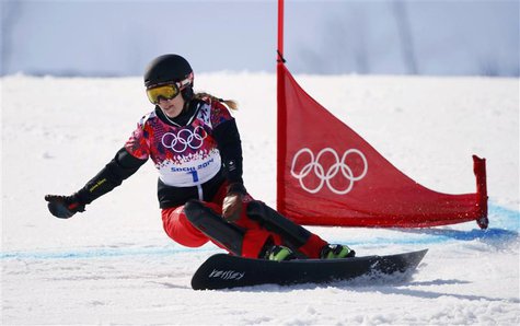 Switzerland's Patrizia Kummer competes during the women's snowboard parallel giant slalom finals at the 2014 Sochi Winter Olympic Games in R Switzerland's Patrizia Kummer competes during the women's snowboard parallel giant slalom finals at the 2014 Sochi Winter Olympic Games in R