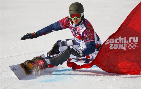 Russia's Vic Wild competes during the men's snowboard parallel giant slalom qualification run at the 2014 Sochi Winter Olympic Games in Rosa Russia's Vic Wild competes during the men's snowboard parallel giant slalom qualification run at the 2014 Sochi Winter Olympic Games in Rosa