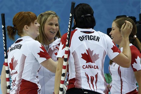 Canada's lead Dawn McEwen, skip Jennifer Jones, Jill Officer and vice Kaitlyn Lawes (L-R) celebrate after winning their women's curling semi Canada's lead Dawn McEwen, skip Jennifer Jones, Jill Officer and vice Kaitlyn Lawes (L-R) celebrate after winning their women's curling semi
