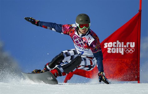 Russia's Vic Wild competes during the men's snowboard parallel giant slalom qualifying heats at the 2014 Sochi Winter Olympic Games in Rosa Russia's Vic Wild competes during the men's snowboard parallel giant slalom qualifying heats at the 2014 Sochi Winter Olympic Games in Rosa