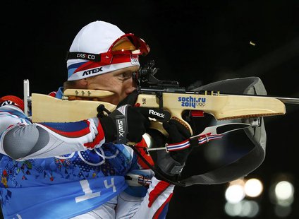 Ondrej Moravec of the Czech Republic shoots during the mixed biathlon relay at the 2014 Sochi Winter Olympics February 19, 2014. REUTERS/Mic Ondrej Moravec of the Czech Republic shoots during the mixed biathlon relay at the 2014 Sochi Winter Olympics February 19, 2014. REUTERS/Mic