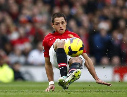 Manchester United's Javier Hernandez controls the ball during their English Premier League soccer match against Newcastle United at Old Traf Manchester United's Javier Hernandez controls the ball during their English Premier League soccer match against Newcastle United at Old Traf
