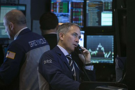 Traders work on the floor of the New York Stock Exchange February 19, 2014. REUTERS/Brendan McDermid Traders work on the floor of the New York Stock Exchange February 19, 2014. REUTERS/Brendan McDermid