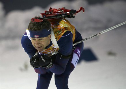 Norway's Ole Einar Bjoerndalen skis during the mixed biathlon relay at the Sochi 2014 Winter Olympics February 19, 2014. REUTERS/Sergei Karp Norway's Ole Einar Bjoerndalen skis during the mixed biathlon relay at the Sochi 2014 Winter Olympics February 19, 2014. REUTERS/Sergei Karp