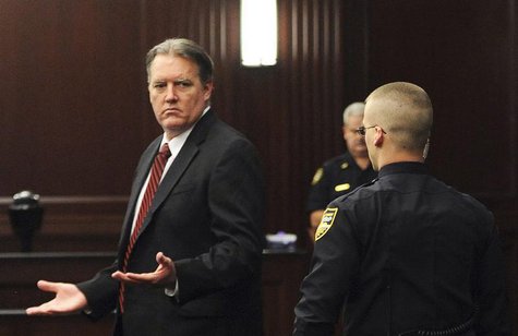 Michael Dunn (L) raises his hands in disbelief as he looks toward his parents after the verdicts were announced in his trial in Jacksonville Michael Dunn (L) raises his hands in disbelief as he looks toward his parents after the verdicts were announced in his trial in Jacksonville