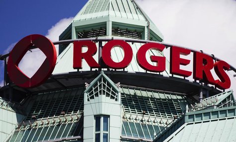 The Rogers sign is seen atop the Rogers Communications headquarters building on the day of their annual general meeting for shareholders in The Rogers sign is seen atop the Rogers Communications headquarters building on the day of their annual general meeting for shareholders in