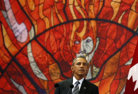 U.S. President Barack Obama joins Mexico's President Enrique Pena Nieto (unseen) and Canada's Prime Minister Stephen Harper (unseen) for a n U.S. President Barack Obama joins Mexico's President Enrique Pena Nieto (unseen) and Canada's Prime Minister Stephen Harper (unseen) for a n