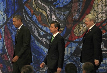 U.S. President Barack Obama (L) arrives with Mexico's President Enrique Pena Nieto (C) and Canada's Prime Minister Stephen Harper to attend U.S. President Barack Obama (L) arrives with Mexico's President Enrique Pena Nieto (C) and Canada's Prime Minister Stephen Harper to attend