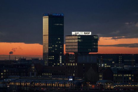 General view of buildings with advertising signs of the German insurer Allianz and the chemical company BASF during sunset in Berlin, Novemb General view of buildings with advertising signs of the German insurer Allianz and the chemical company BASF during sunset in Berlin, Novemb