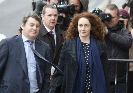 Former News International chief executive Rebekah Brooks and her husband Charlie Brooks (L) arrive at the Old Bailey courthouse in London Fe Former News International chief executive Rebekah Brooks and her husband Charlie Brooks (L) arrive at the Old Bailey courthouse in London Fe