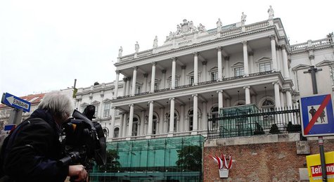 A cameraman films outside Palais Coburg hotel where nuclear talks are taking place in Vienna February 19, 2014. REUTERS/Heinz-Peter Bader A cameraman films outside Palais Coburg hotel where nuclear talks are taking place in Vienna February 19, 2014. REUTERS/Heinz-Peter Bader